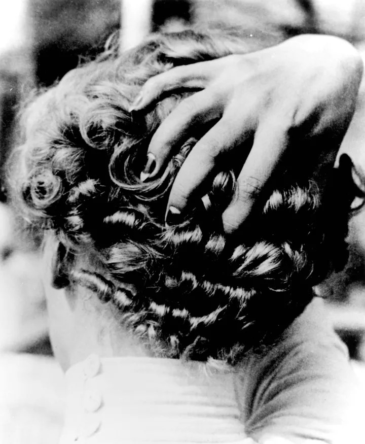 Lee Miller, Untitled [woman with hand on head], Paris, 1931 © Lee Miller Archives, East Sussex, England. www.leemiller.co.uk